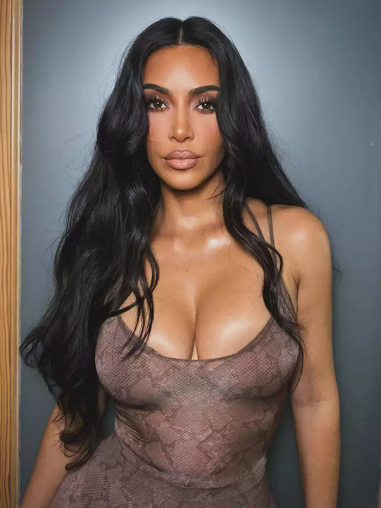 Kim Kardashian's Boobs Burst Out in Snakeskin